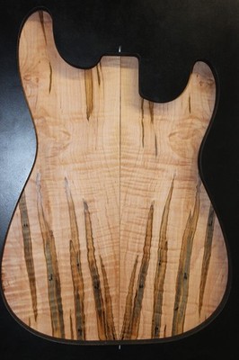 Figured ambrosia maple bookmatched guitar top.
