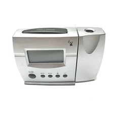 Atomic Projection Clock With Alarm , Day, Time TESTED NO POWER CORD TAKES BATTER