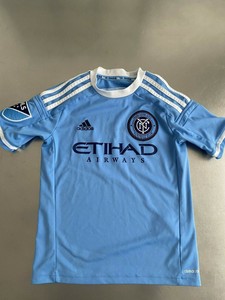 light blue adidas soccer jersey