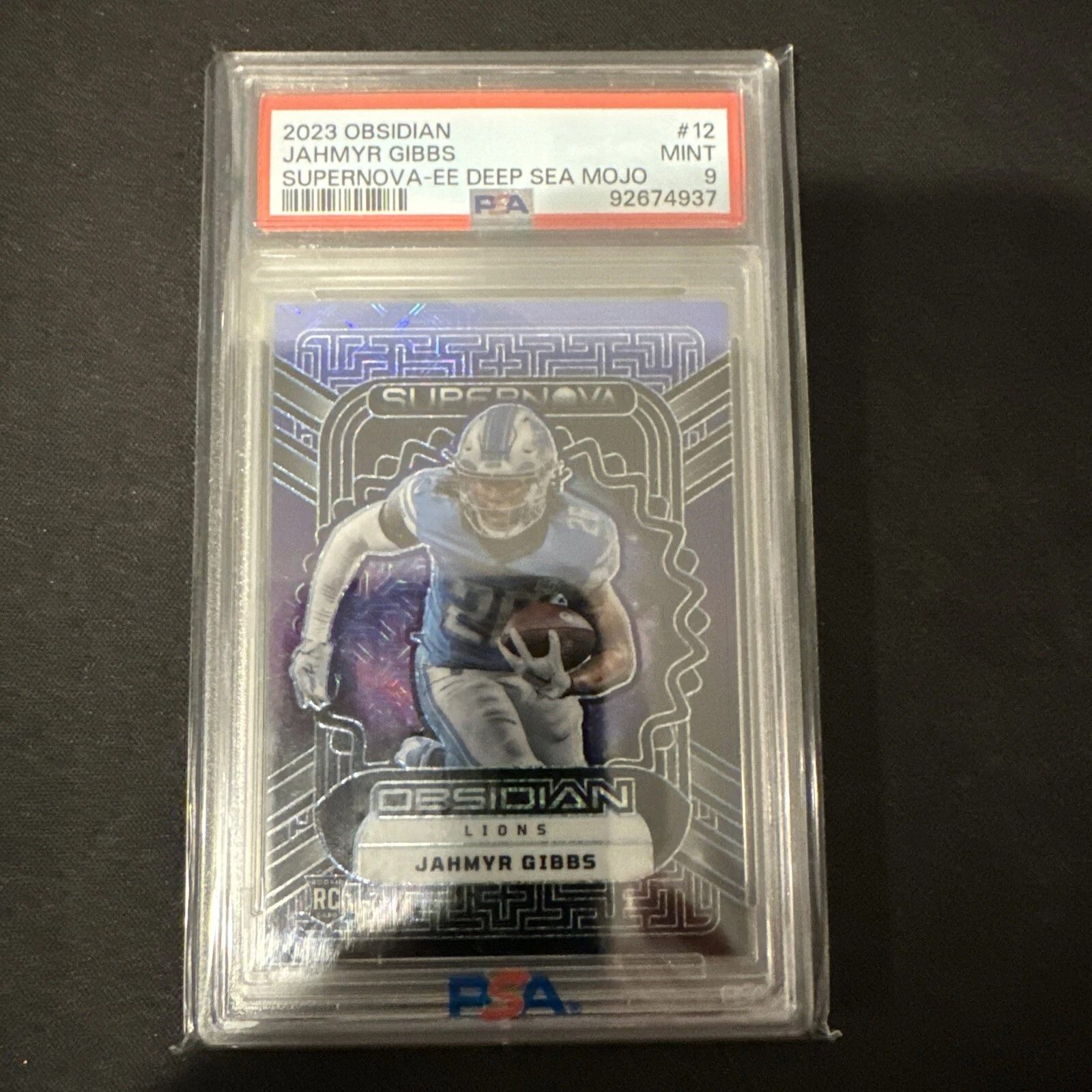 Jahmyr Gibbs Panini Obsidian Supernova #12 Electric Etch Deep Sea Mojo