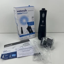 New - Waterpik Water Flosser Cordless Plus Model WP-462W w/ 4 Tips 2 Settings