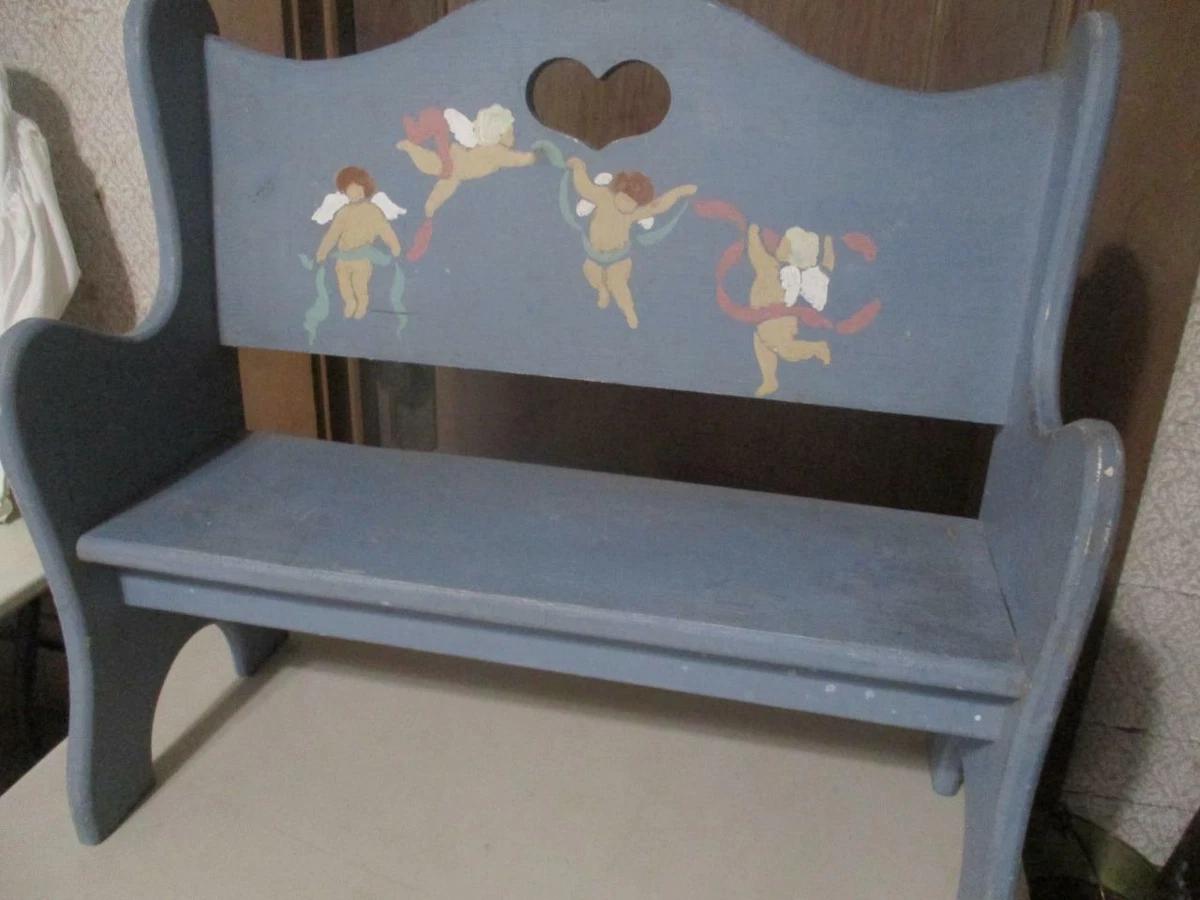 Wooden bench with heart cutout deals