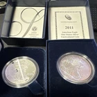 2 pc. United States Mint American Eagle 2005 Proof & 2011 Unc 1 oz Silver Coins