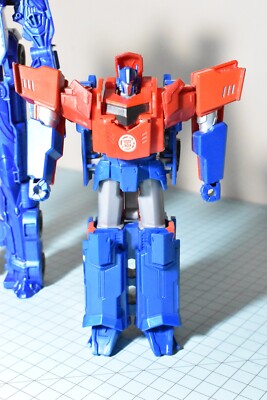 Ripley - FIGURA DE ACCION TRANSFORMERS MEGA MIGHTIES OPTIMUS PRIME