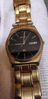 Vintage Seiko Quartz Watch Mens 32mm Black Dial Day Date Gold Tone 6923-7039