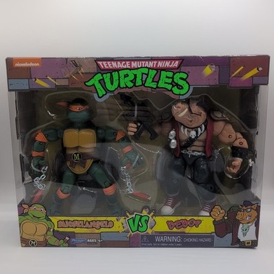 Playmates Teenage Mutant Ninja Turtles Michelangelo Vs Bebop Action Figures