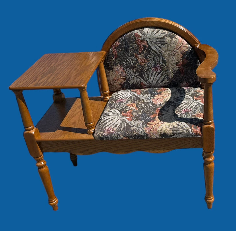 Telephone stand with seat outlet