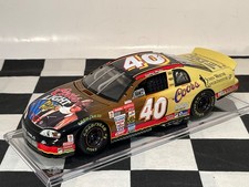 ELITE 1:24 Sterling Marlin #40 Coors Light/John Wayne 1999 Chevy #162 of 1500