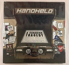 HANDHELD – A CANADIAN TRAGEDY - VINYL LP LIMITED RED TRANSLUCENT - NM - A21