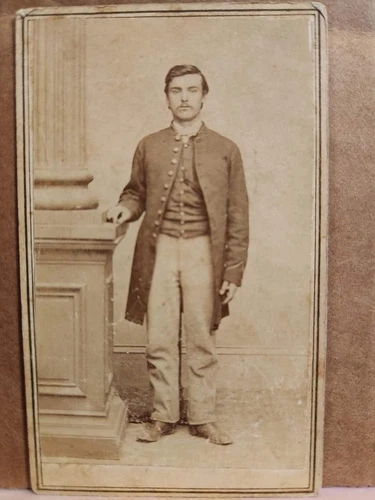 Cdv of a Union soldier in a frock coat with a Plattsburg, NY, backmark.