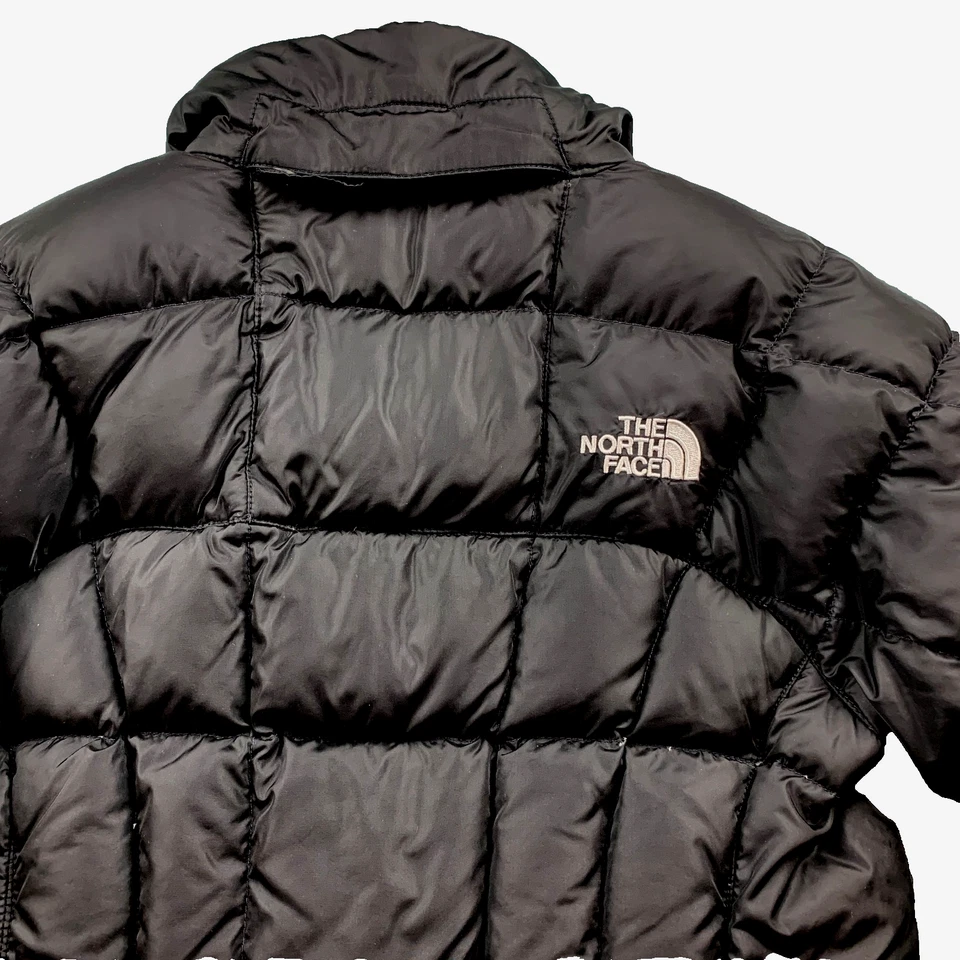 Chaqueta acolchada The North Face 550 para niñas talla pequeña negra plumón cremallera completa P S3 Foto 4 de 4