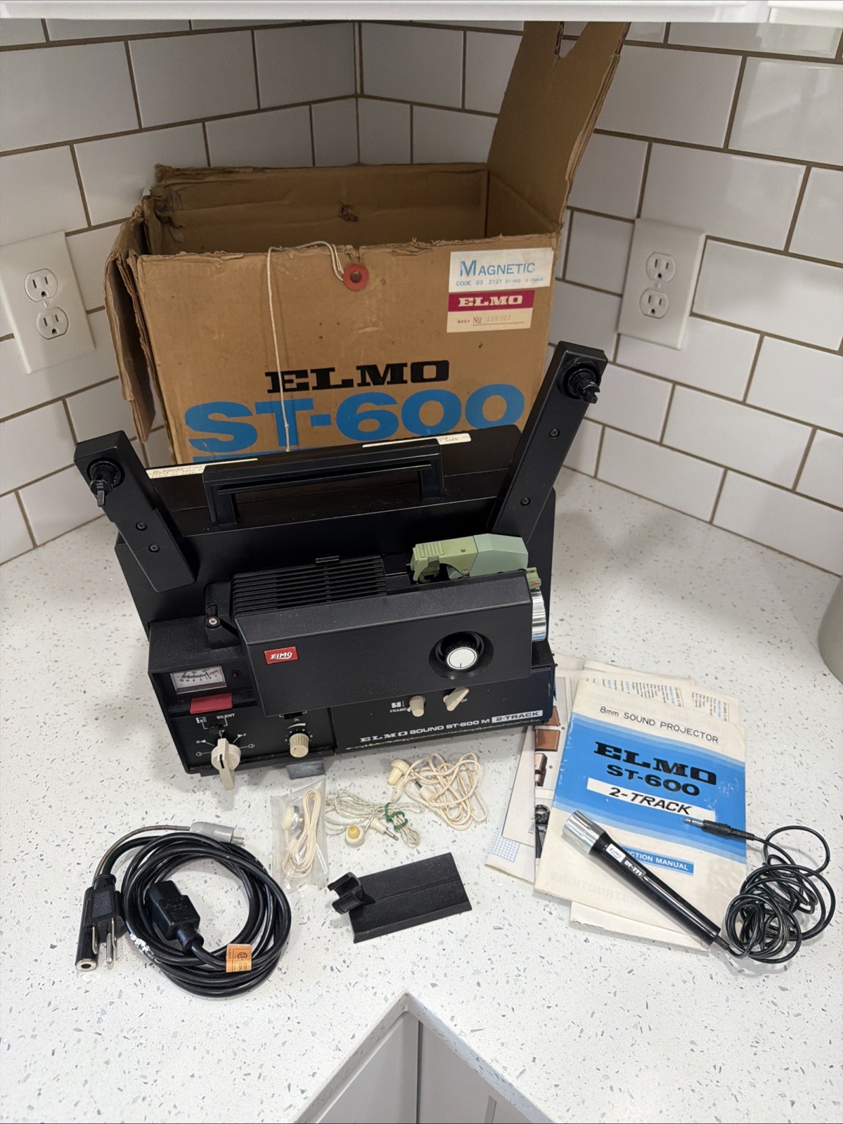ELMO ST-600 2-Track 8mm Sound Movie Projector With Microphone, Manuals, & Box