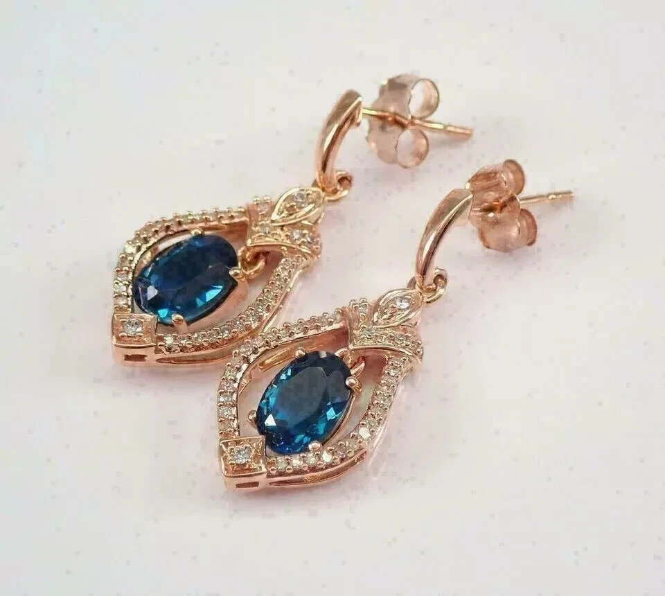 3 Ct Oval Cut Lab Created London Blue Topaz Dangle Earrings 14K Rose Gold Plated Foto 2 de 4