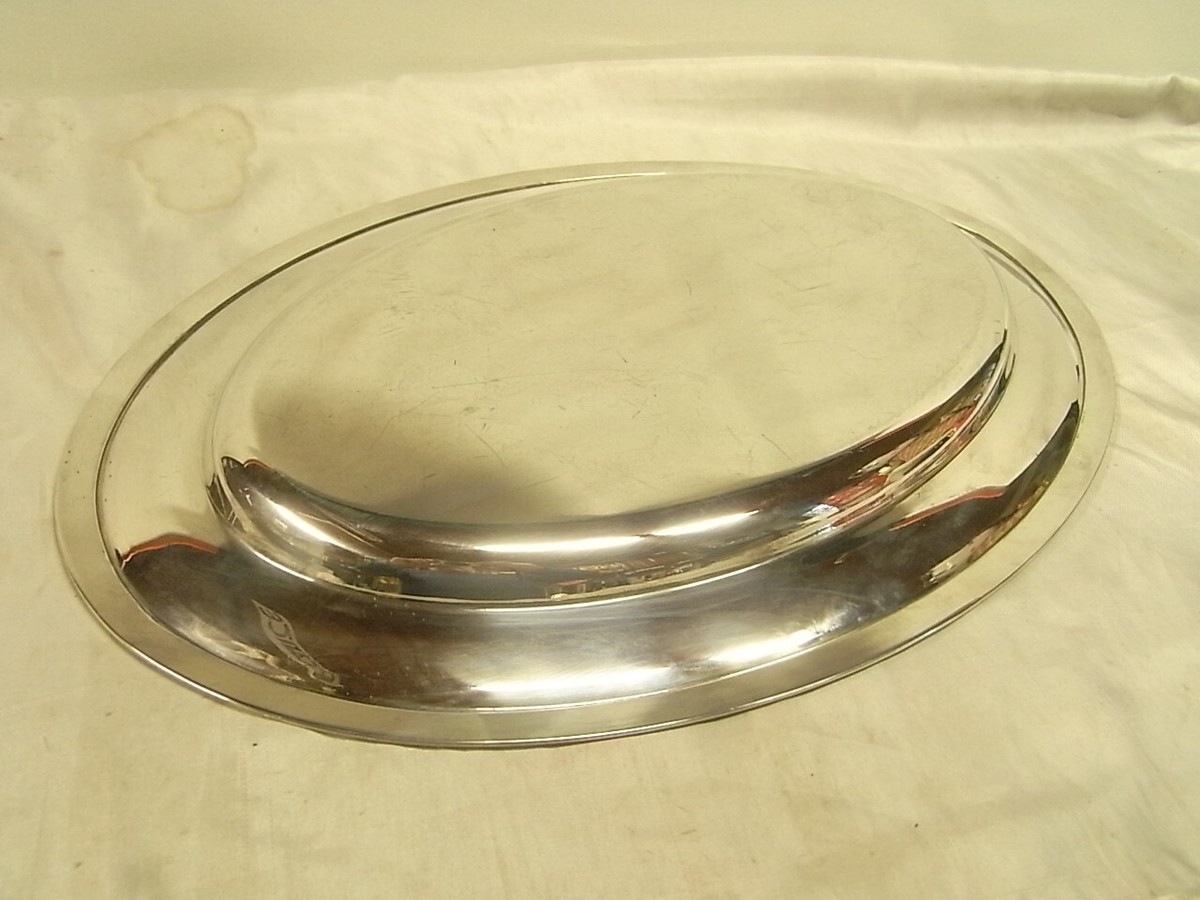 Superbe grand plat ovale en métal argenté orfèvre a définir
