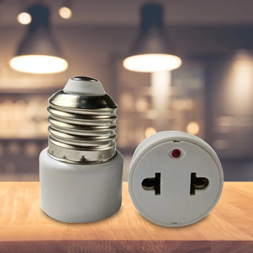 Light fixture with electrical outlet outlet