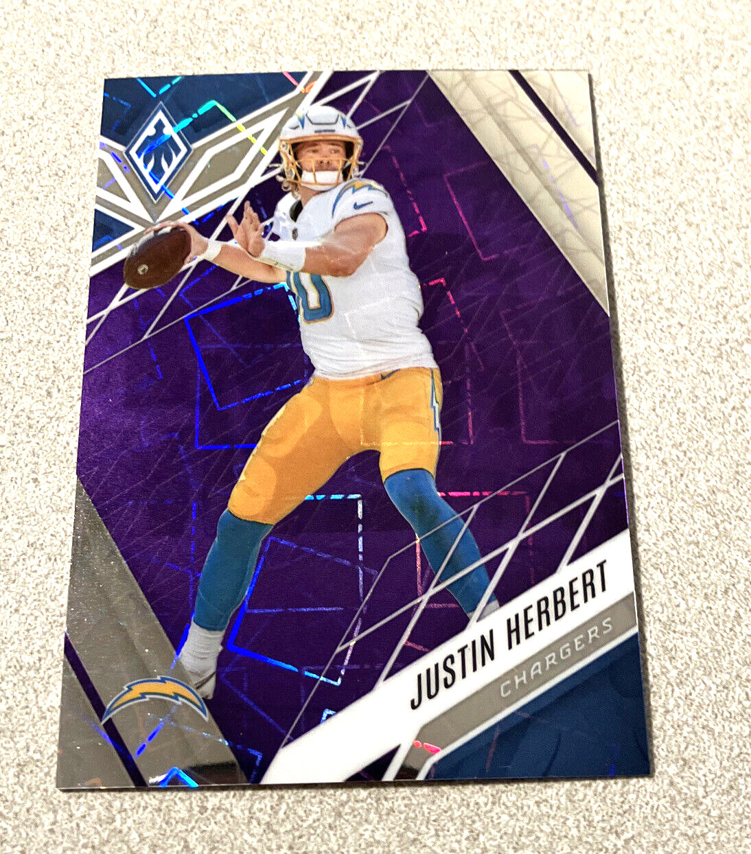 2022 Panini Phoenix Purple Lazer #49 Justin Herbert Chargers /99