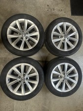 (4) VW Volkswagen Golf Beetle EOS Jetta Passat Rabbit Wheels Rims + Caps 17"