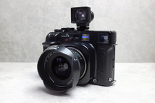 Mamiya 7ii camera + 80mm f4 lens, 43mm f4.5 lens, filters and batteries.