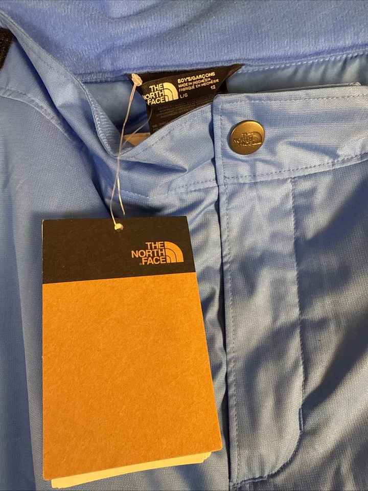 Pantalones de nieve The North Face para niños Freedom aislados EZ Grow Optic azul talla L (12) Foto 2 de 4