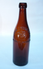 ZYNDA DETROIT MICHIGAN FLYING EAGLE BALTIMORE LOOP SEAL AMBER BEER BOTTLE