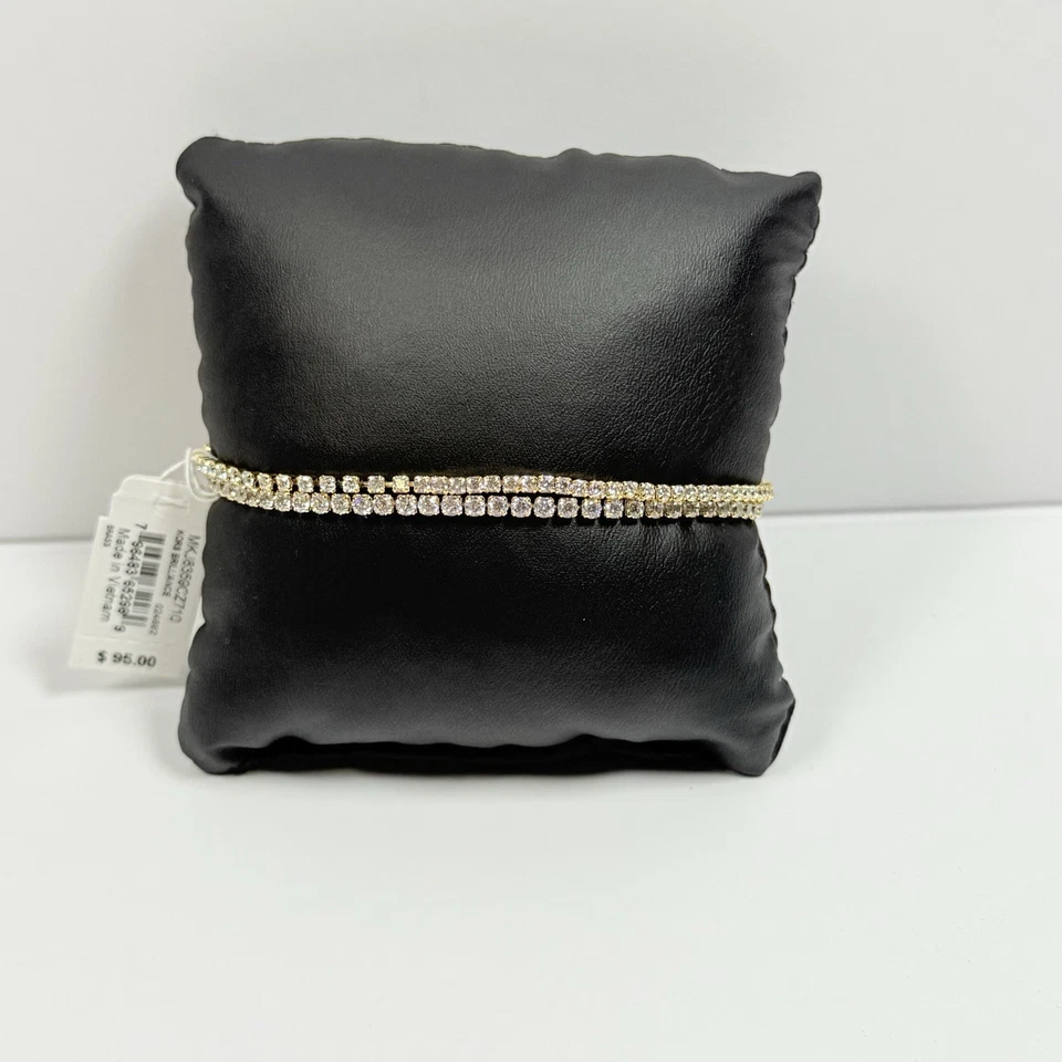 Pulsera Michael Kors tono dorado brillante para dama MKJ8359CZ710 Foto 2 de 3