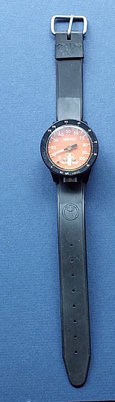 Vintage Aqua Lung Aquarius U.S. Divers wrist depth gauge, black and orange