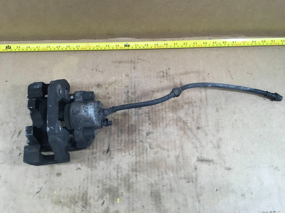 Pinza de freno trasera derecha o izquierda BMW X5 2012 6776787/6776788 OEM. Foto 2 de 4