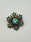 Vintage Snowflake Brooch Pin Blue Crystal Rhinestone Antique Gold Tone Starburst