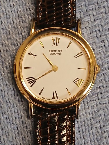 Seiko 25mm Gold Tone White Dial Women's Watch 1N00-0D50 New Battery