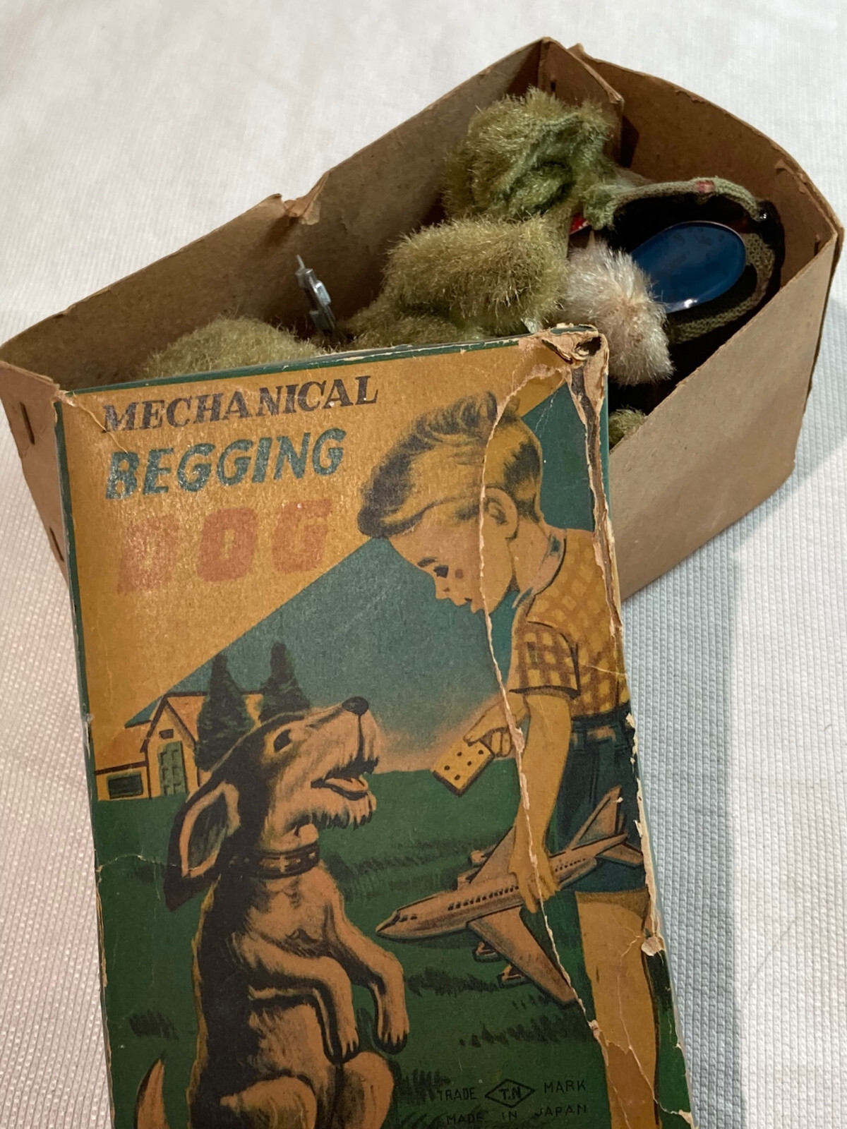 Antique mechanical dog toy wind up begging dog in original box