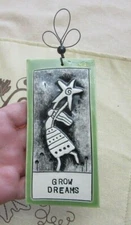 Art pottery plaque. Girl with star. " Grow Dreams "
