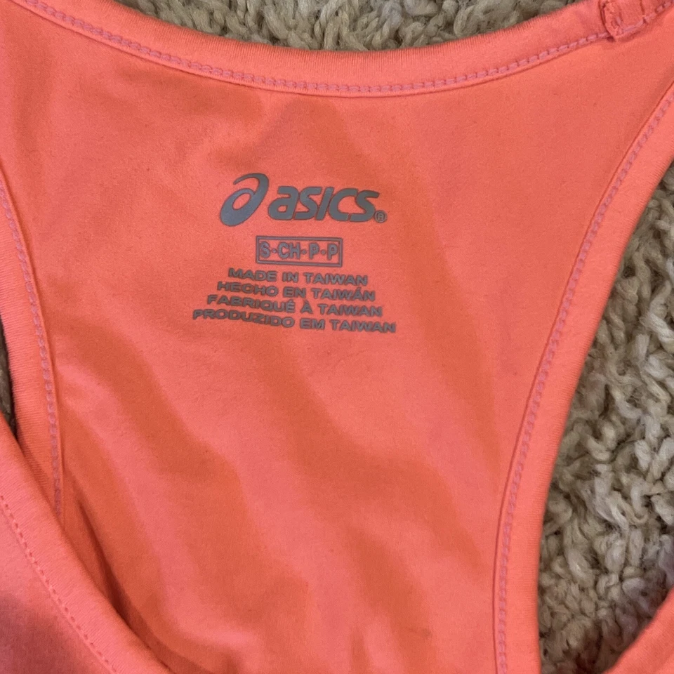 Camisa sin mangas Asics pequeña de entrenamiento coral para mujer Foto 2 de 4