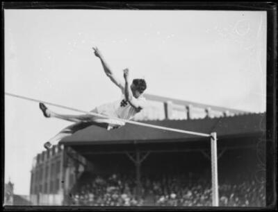 Athlete Jack Metcalfe approaching the bar during a high jump, NSW,- Old Photo 1