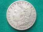1886-O Morgan Silver Dollar in Extra Vine Fine Condition