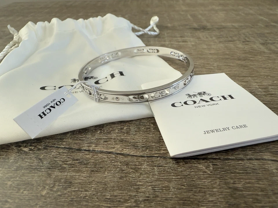 Brazalete Coach 1707 Signature cristal tono plata nuevo con etiquetas Foto 2 de 4