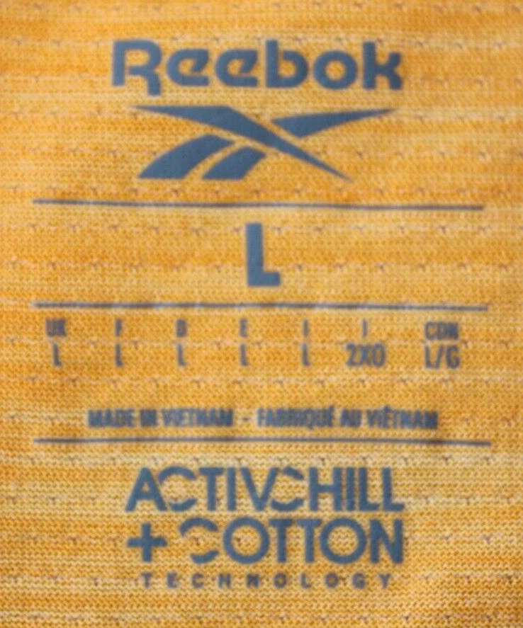 Camiseta pulóver REEBOK talla L para hombre manga corta cuello redondo naranja Foto 3 de 4