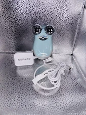 NuFACE Power Blue Mini Facial Toning Device with original charger