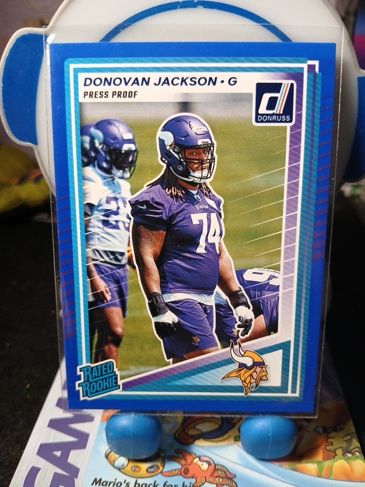 2025 Panini Donruss Donovan Jackson Rated Rookie Blue Press Proof 381 RC Vikings