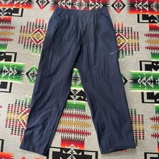 Pantalones de lluvia impermeables vintage Nike Golf Storm Fit para hombre XL azul cremallera al tobillo Y2K A7