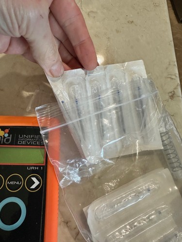 Portable RFID microchip reader and 30 MICROCHIPS
