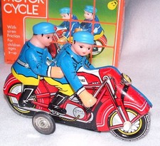 TIN MOTORCYCLE WITH 2 RIDERS  SIREN FRICTION TOY 6"LONG 1990s MINT w/BOX CHINA