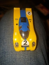 Magnatraction 1/64 HO Scale Slot Car Tomy Aurora AFX TYCO Porsche 917k yellow