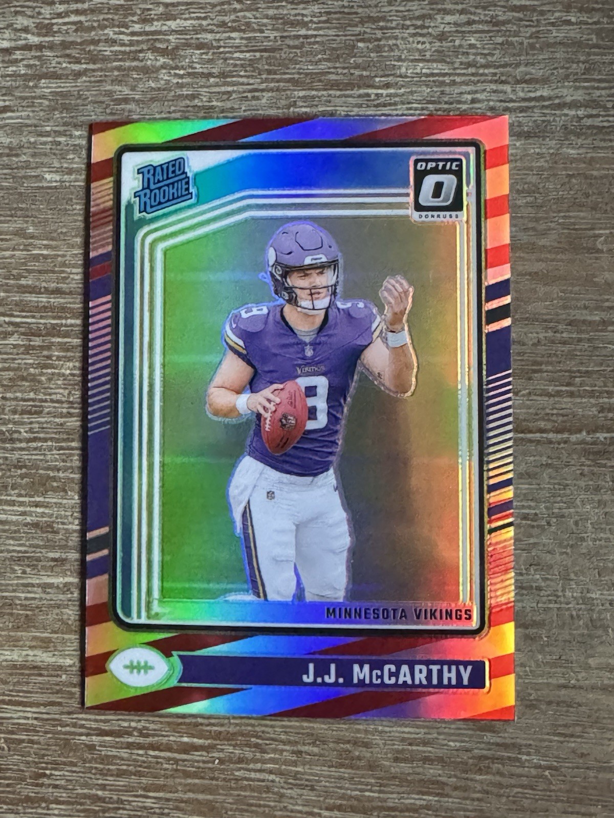 2024 Panini Donruss Optic - Rated Rookie J.J. McCarthy #235 Freedom Prizm (RC)