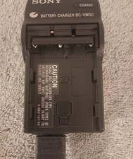 Sony BC-VM50 Battery Charger With 4 Np-fm30 Batteries
