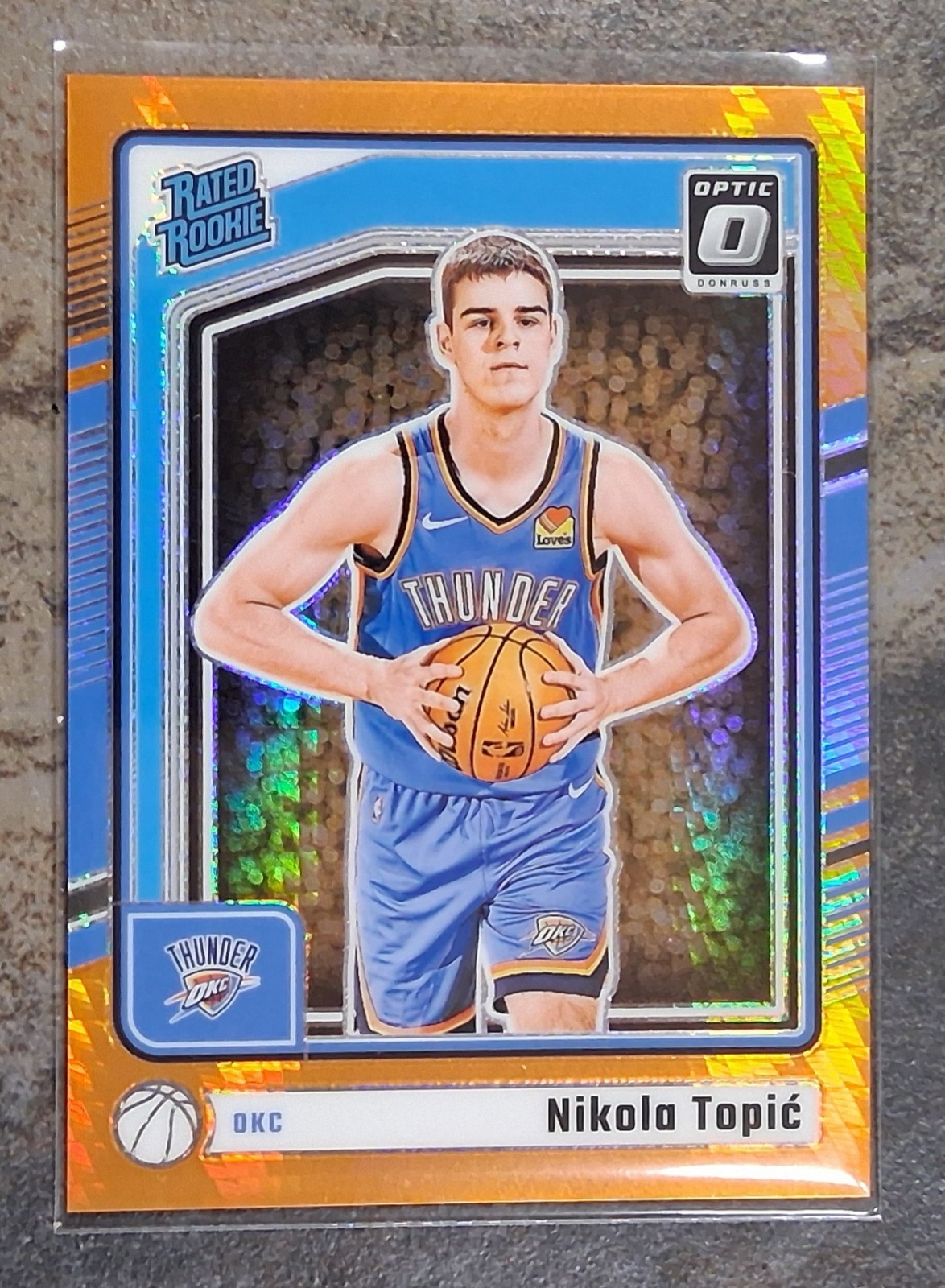 #184 /299 Nikola Topic 2024-25 Panini Optic Rated Rookie Orange Hyper Prizm #278