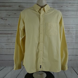 pale yellow long sleeve shirt