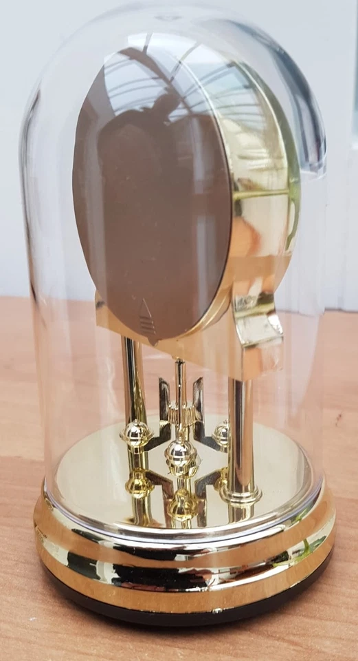 petite horloge à poser, Quartz, pendule rotatif, dorée sous dome plexi, Germany - Photo 2/2