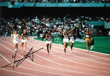 tommie smith arms out raised winning 200m final MEXICO CITY signed 12x8 photo