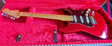 FENDER 1999 AMERICAN DELUXE STRATOCASTER Maple neck,Crimson Trans., and Gig Bag
