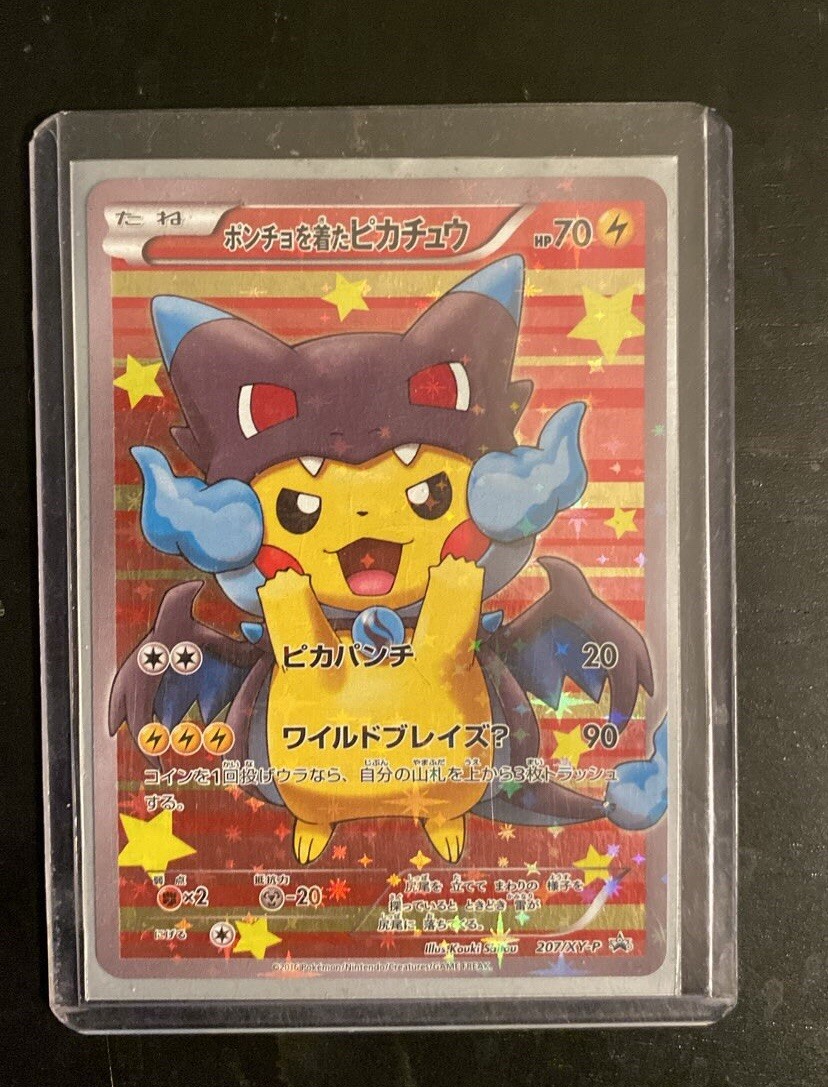 Pokemon Card Poncho-Wearing Pikachu 2016 XY Promo #207 Charizard